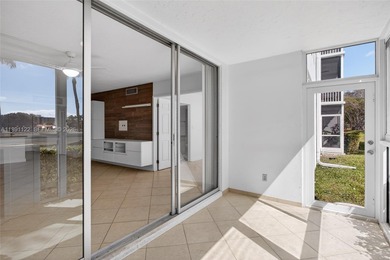 Beautifully updated 2 bed, 2 bath first-floor condo. New white on Palm-Aire Country Club and Resort - Palms in Florida - for sale on GolfHomes.com, golf home, golf lot