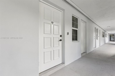 Beautifully updated 2 bed, 2 bath first-floor condo. New white on Palm-Aire Country Club and Resort - Palms in Florida - for sale on GolfHomes.com, golf home, golf lot