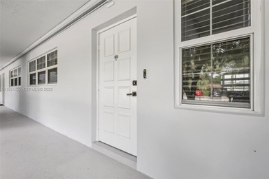 Beautifully updated 2 bed, 2 bath first-floor condo. New white on Palm-Aire Country Club and Resort - Palms in Florida - for sale on GolfHomes.com, golf home, golf lot