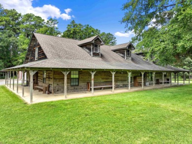 Nestled on 21 picturesque acres, this 4-bedroom, 3-bath rustic on Rayburn Country Club in Texas - for sale on GolfHomes.com, golf home, golf lot