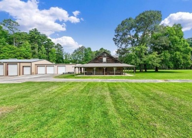 Nestled on 21 picturesque acres, this 4-bedroom, 3-bath rustic on Rayburn Country Club in Texas - for sale on GolfHomes.com, golf home, golf lot