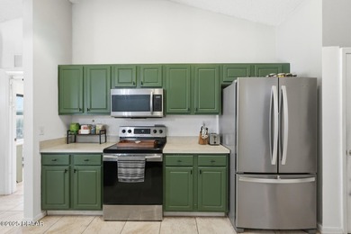 Beautiful and well-maintained 4-bedroom, 2-bath home located in on Palm Harbor Golf Club in Florida - for sale on GolfHomes.com, golf home, golf lot