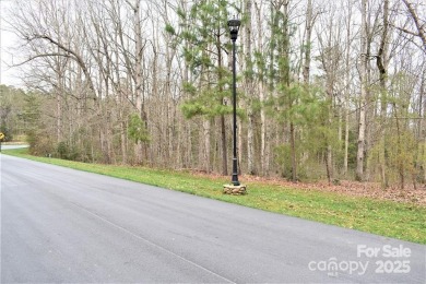 This Badin Lake waterfront lot is located in the prestigious on Old North State Club at Uwharrie Point Golf community in North Carolina - for sale on GolfHomes.com, golf home, golf lot