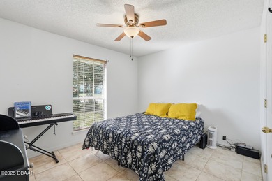 Beautiful and well-maintained 4-bedroom, 2-bath home located in on Palm Harbor Golf Club in Florida - for sale on GolfHomes.com, golf home, golf lot