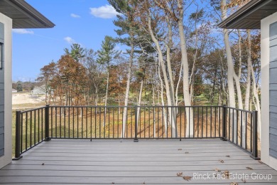 Welcome to your dream home--an exquisite retreat perfectly on Muskegon Country Club in Michigan - for sale on GolfHomes.com, golf home, golf lot