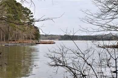 This Badin Lake waterfront lot is located in the prestigious on Old North State Club at Uwharrie Point Golf community in North Carolina - for sale on GolfHomes.com, golf home, golf lot