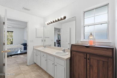 Beautiful and well-maintained 4-bedroom, 2-bath home located in on Palm Harbor Golf Club in Florida - for sale on GolfHomes.com, golf home, golf lot