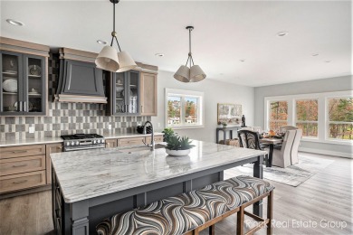 Welcome to your dream home--an exquisite retreat perfectly on Muskegon Country Club in Michigan - for sale on GolfHomes.com, golf home, golf lot