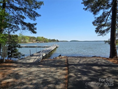 This Badin Lake waterfront lot is located in the prestigious on Old North State Club at Uwharrie Point Golf community in North Carolina - for sale on GolfHomes.com, golf home, golf lot