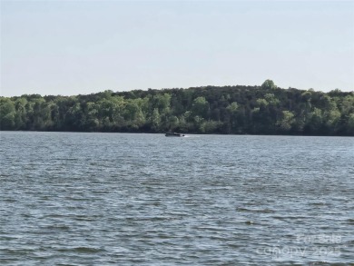 This Badin Lake waterfront lot is located in the prestigious on Old North State Club at Uwharrie Point Golf community in North Carolina - for sale on GolfHomes.com, golf home, golf lot