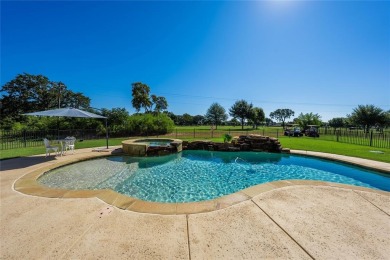 This beautifully designed home offers a private entrance to the on Cedar Creek Country Club in Texas - for sale on GolfHomes.com, golf home, golf lot