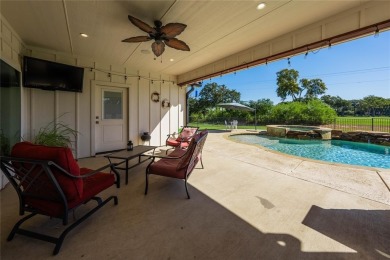 This beautifully designed home offers a private entrance to the on Cedar Creek Country Club in Texas - for sale on GolfHomes.com, golf home, golf lot