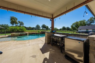 This beautifully designed home offers a private entrance to the on Cedar Creek Country Club in Texas - for sale on GolfHomes.com, golf home, golf lot