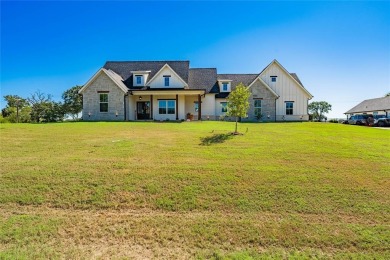 This beautifully designed home offers a private entrance to the on Cedar Creek Country Club in Texas - for sale on GolfHomes.com, golf home, golf lot