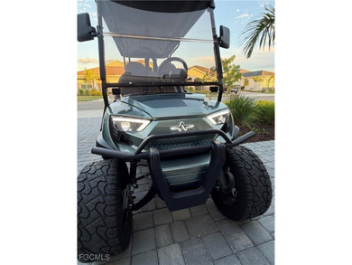 Ride in Style! This home includes a premium Atlas six-seater on Babcock National Golf Course in Florida - for sale on GolfHomes.com, golf home, golf lot