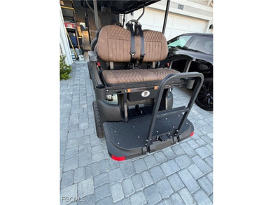 Ride in Style! This home includes a premium Atlas six-seater on Babcock National Golf Course in Florida - for sale on GolfHomes.com, golf home, golf lot