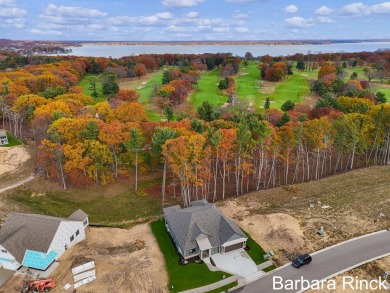 Welcome to your dream home--an exquisite retreat perfectly on Muskegon Country Club in Michigan - for sale on GolfHomes.com, golf home, golf lot