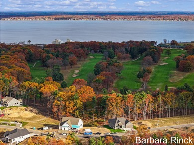 Welcome to your dream home-an exquisite retreat perfectly on Muskegon Country Club in Michigan - for sale on GolfHomes.com, golf home, golf lot