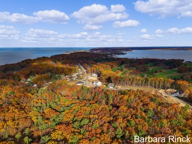 Welcome to your dream home-an exquisite retreat perfectly on Muskegon Country Club in Michigan - for sale on GolfHomes.com, golf home, golf lot
