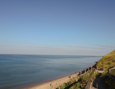 Welcome to your dream home-an exquisite retreat perfectly on Muskegon Country Club in Michigan - for sale on GolfHomes.com, golf home, golf lot