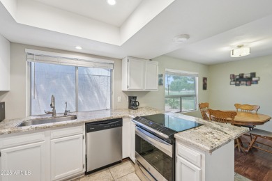 Spacious 3-bedroom, 2-bath townhouse with a loft in the on Bellaire Golf Club in Arizona - for sale on GolfHomes.com, golf home, golf lot