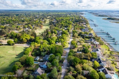 Located on the highly coveted Bald Eagle Lane, this wooded on Porters Neck Country Club in North Carolina - for sale on GolfHomes.com, golf home, golf lot