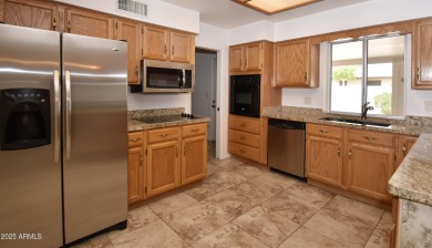 This Bright, Cheerful, & Upgraded Open-Plan Home is Tucked Away on Sunland Village East Golf Course in Arizona - for sale on GolfHomes.com, golf home, golf lot