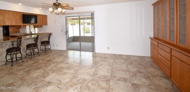 This Bright, Cheerful, & Upgraded Open-Plan Home is Tucked Away on Sunland Village East Golf Course in Arizona - for sale on GolfHomes.com, golf home, golf lot