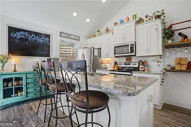 Enjoy peaceful living in this charming 2-bedroom, 2-bath home on The Highlands Course at Lake Arrowhead in Georgia - for sale on GolfHomes.com, golf home, golf lot