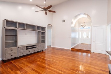 This beautiful home is nestled amidst gently rolling hills in on Vista Valencia Golf Course in California - for sale on GolfHomes.com, golf home, golf lot