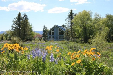 Step into a meticulously maintained interior boasting 4 bedrooms on Cedar Creek Golf Course in Wyoming - for sale on GolfHomes.com, golf home, golf lot