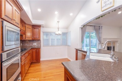 This beautiful home is nestled amidst gently rolling hills in on Vista Valencia Golf Course in California - for sale on GolfHomes.com, golf home, golf lot