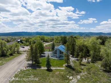 Step into a meticulously maintained interior boasting 4 bedrooms on Cedar Creek Golf Course in Wyoming - for sale on GolfHomes.com, golf home, golf lot