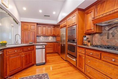 This beautiful home is nestled amidst gently rolling hills in on Vista Valencia Golf Course in California - for sale on GolfHomes.com, golf home, golf lot