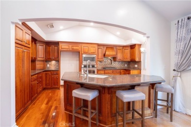 This beautiful home is nestled amidst gently rolling hills in on Vista Valencia Golf Course in California - for sale on GolfHomes.com, golf home, golf lot