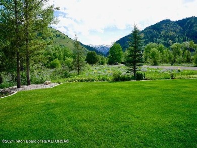 Step into a meticulously maintained interior boasting 4 bedrooms on Cedar Creek Golf Course in Wyoming - for sale on GolfHomes.com, golf home, golf lot