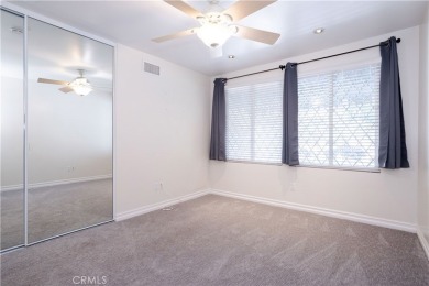 This beautiful home is nestled amidst gently rolling hills in on Vista Valencia Golf Course in California - for sale on GolfHomes.com, golf home, golf lot