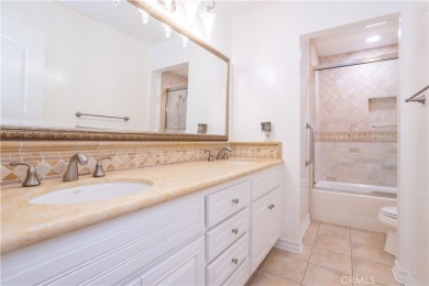 This beautiful home is nestled amidst gently rolling hills in on Vista Valencia Golf Course in California - for sale on GolfHomes.com, golf home, golf lot