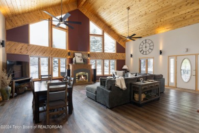 Step into a meticulously maintained interior boasting 4 bedrooms on Cedar Creek Golf Course in Wyoming - for sale on GolfHomes.com, golf home, golf lot