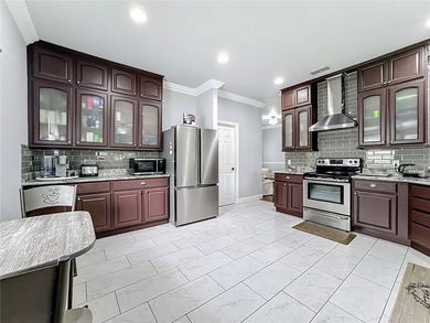 Perfect as your primary residence or vacation home. This on Stonegate Golf Club in Florida - for sale on GolfHomes.com, golf home, golf lot