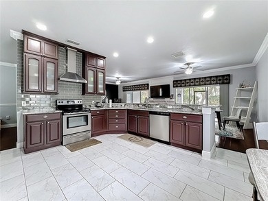 Perfect as your primary residence or vacation home. This on Stonegate Golf Club in Florida - for sale on GolfHomes.com, golf home, golf lot