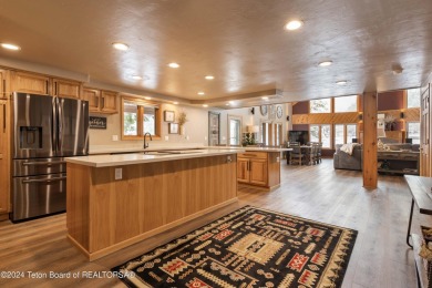 Step into a meticulously maintained interior boasting 4 bedrooms on Cedar Creek Golf Course in Wyoming - for sale on GolfHomes.com, golf home, golf lot