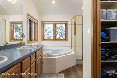 Step into a meticulously maintained interior boasting 4 bedrooms on Cedar Creek Golf Course in Wyoming - for sale on GolfHomes.com, golf home, golf lot