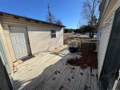 Welcome to 34 Bokchito in Canadian! This 4-bedroom, 2 bath home on Arrowhead State Park Golf Course in Oklahoma - for sale on GolfHomes.com, golf home, golf lot