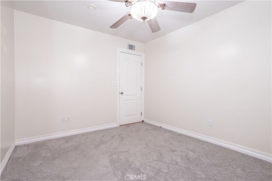 This beautiful home is nestled amidst gently rolling hills in on Vista Valencia Golf Course in California - for sale on GolfHomes.com, golf home, golf lot