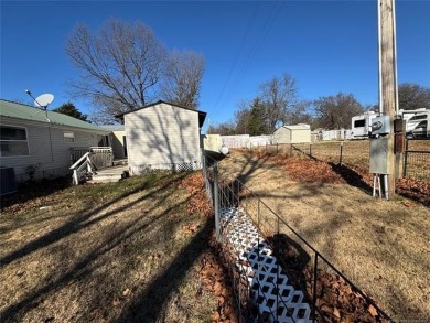 Welcome to 34 Bokchito in Canadian! This 4-bedroom, 2 bath home on Arrowhead State Park Golf Course in Oklahoma - for sale on GolfHomes.com, golf home, golf lot