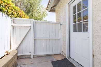 This beautiful home is nestled amidst gently rolling hills in on Vista Valencia Golf Course in California - for sale on GolfHomes.com, golf home, golf lot