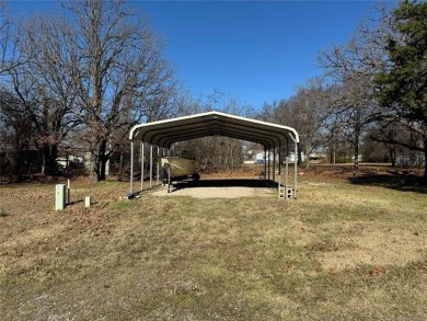 Welcome to 34 Bokchito in Canadian! This 4-bedroom, 2 bath home on Arrowhead State Park Golf Course in Oklahoma - for sale on GolfHomes.com, golf home, golf lot