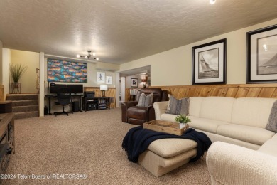 Step into a meticulously maintained interior boasting 4 bedrooms on Cedar Creek Golf Course in Wyoming - for sale on GolfHomes.com, golf home, golf lot