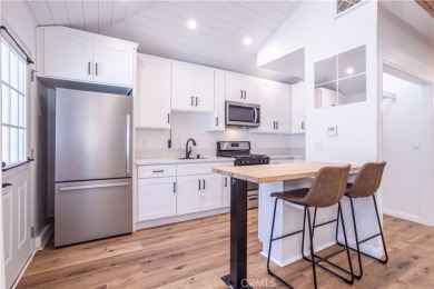 This beautiful home is nestled amidst gently rolling hills in on Vista Valencia Golf Course in California - for sale on GolfHomes.com, golf home, golf lot